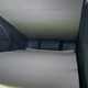 The sleeping area of the VW California with the roof popped