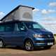 VW California review - 2016 model, front view with roof up, awning side