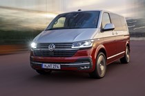 VW Caravelle review - T6.1 facelift, 2019, red and silver, front view, driving at dusk with lights on