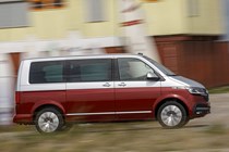 VW Caravelle review - T6.1 facelift, 2019, red and silver, right side view, driving