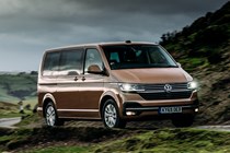 Copper 2020 Volkswagen Caravelle driving front three-quarter