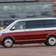 VW Caravelle review - T6.1 facelift, 2019, red and silver, left side view, driving