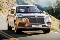 Bentley Bentayga review - 2016 model, front view, driving on road, gold
