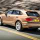 Bentley Bentayga review - 2016 model, rear view, driving, gold