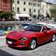 Fiat 124 Spider red driving front side