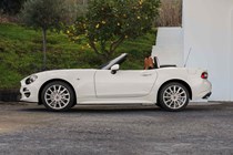 Fiat 124 Spider white side roof down