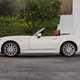 Fiat 124 Spider white side roof down