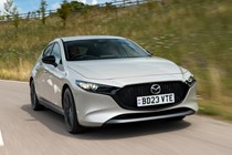 Mazda 3 (2023) review: front driving, silver paint, country lane