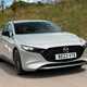 Mazda 3 (2023) review: front driving, silver paint, country lane