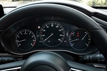 Mazda 3 (2023) review: gauge cluster, black upholstery