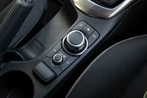 Mazda 2 (2023) review: infotainment screen rotary controller, black trim