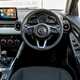 Mazda 2 (2023) review: dashboard and infotainment system, black fabric upholstery
