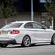 White 2017 BMW 2 Series Coupe rear three-quarter driving