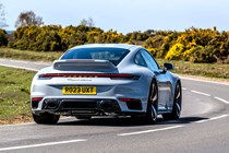 Porsche 911 review (992) - Sport Classic, grey, rear, driving round corner