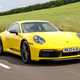 Porsche 911 review (992) - Carrera T, yellow, front, driving