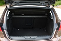Peugeot 308 Hatchback (2014-) UK rhd model in metallic brown. Boot and load space