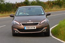 Peugeot 308 Hatchback (2014-) UK rhd model in metallic brown. Keith WR Jones in driving action