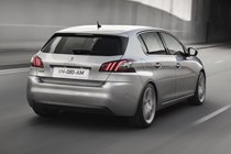 Peugeot 308 Hatchback (2014-) French lhd model in metallic silver. Driving/action from the rear