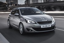 Peugeot 308 Hatchback (2014-) French lhd model in metallic silver. Driving/action front three-quarters