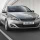 Peugeot 308 Hatchback (2014-) French lhd model in metallic silver. Driving/action