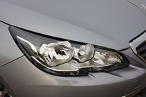 Peugeot 308 Hatchback (2014-) UK rhd model in metallic silver. Exterior detail - front right-hand headlamp assembly
