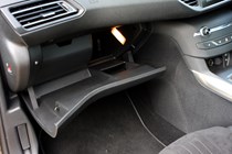 Peugeot 308 Hatchback (2014-) UK rhd model in metallic copper. Interior detail - glove compartment