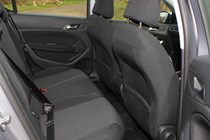 Peugeot 308 Hatchback (2014-) UK rhd model in metallic silver. Interior detail, rear passenger seat