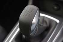 Peugeot 308 Hatchback (2014-) UK rhd model in metallic silver. Interior detail - manual 5-speed gear shift