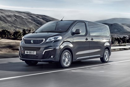 Grey 2020 Peugeot e-Traveller front three-quarter driving