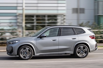 BMW iX1 deal choice, side, driving, silver Deal Watch | Parkers
