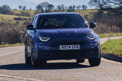 Abarth 600e, purple, front cornering shot | Parkers Deal Watch