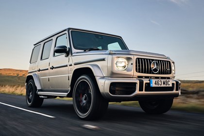 Best luxury SUVs - Mercedes-AMG G-Class, front view, silver, driving on road