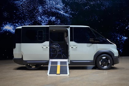 The Kia PV5 WAV with side-loading ramp.