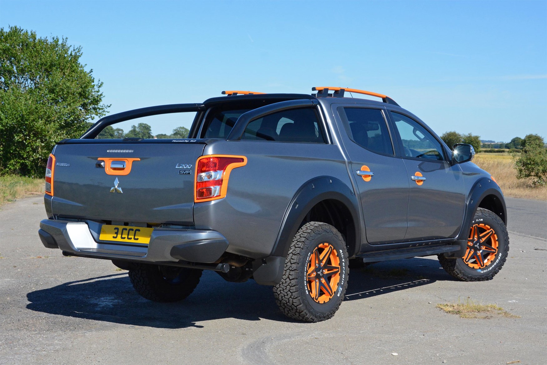 Mitsubishi L200 Barbarian SVP II review - grey and orange, rear view