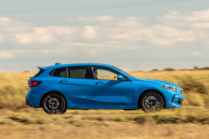 BMW 118i M Sport side profile - driving