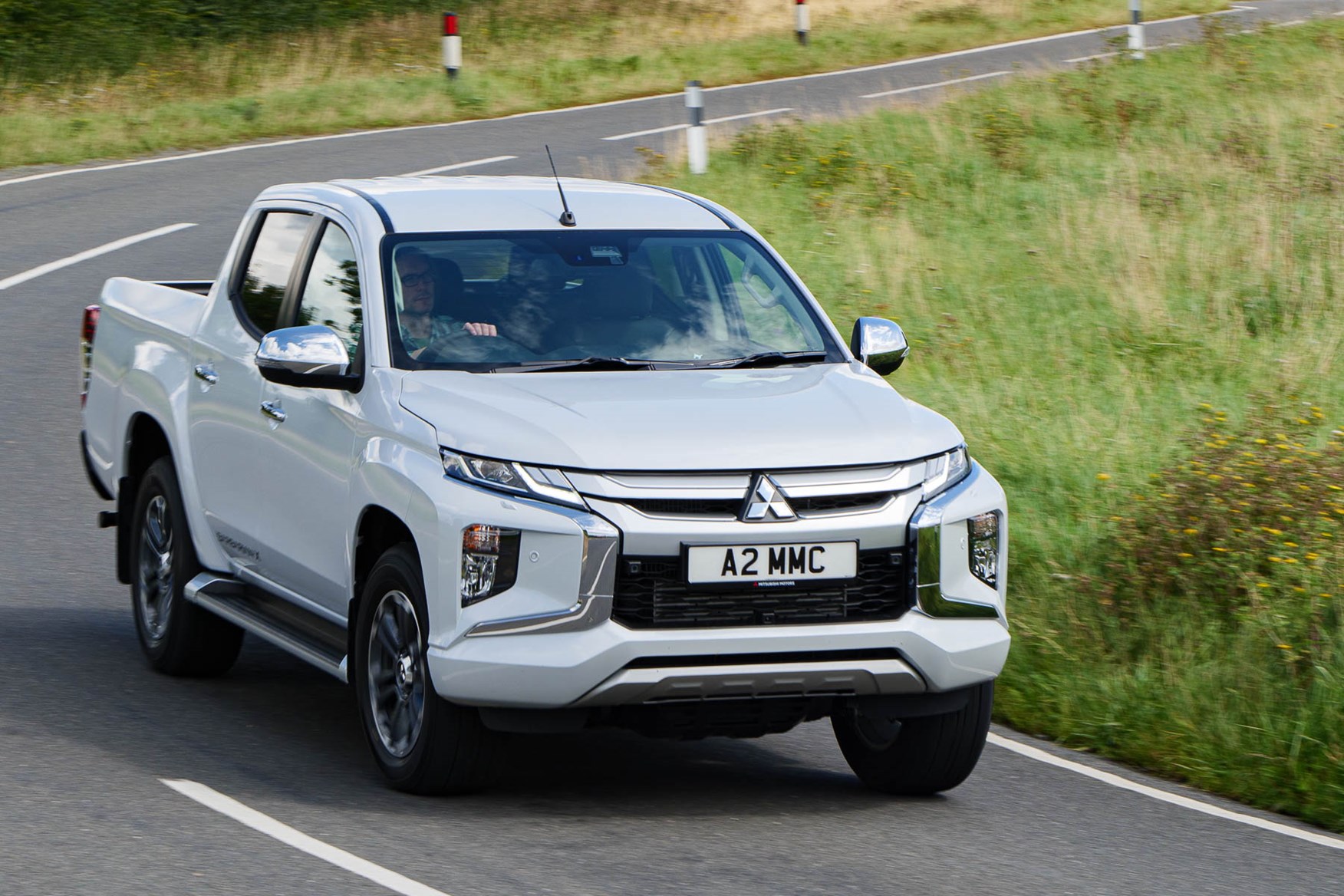 2019 Mitsubishi L200 Barbarian X in Diamond White, driving