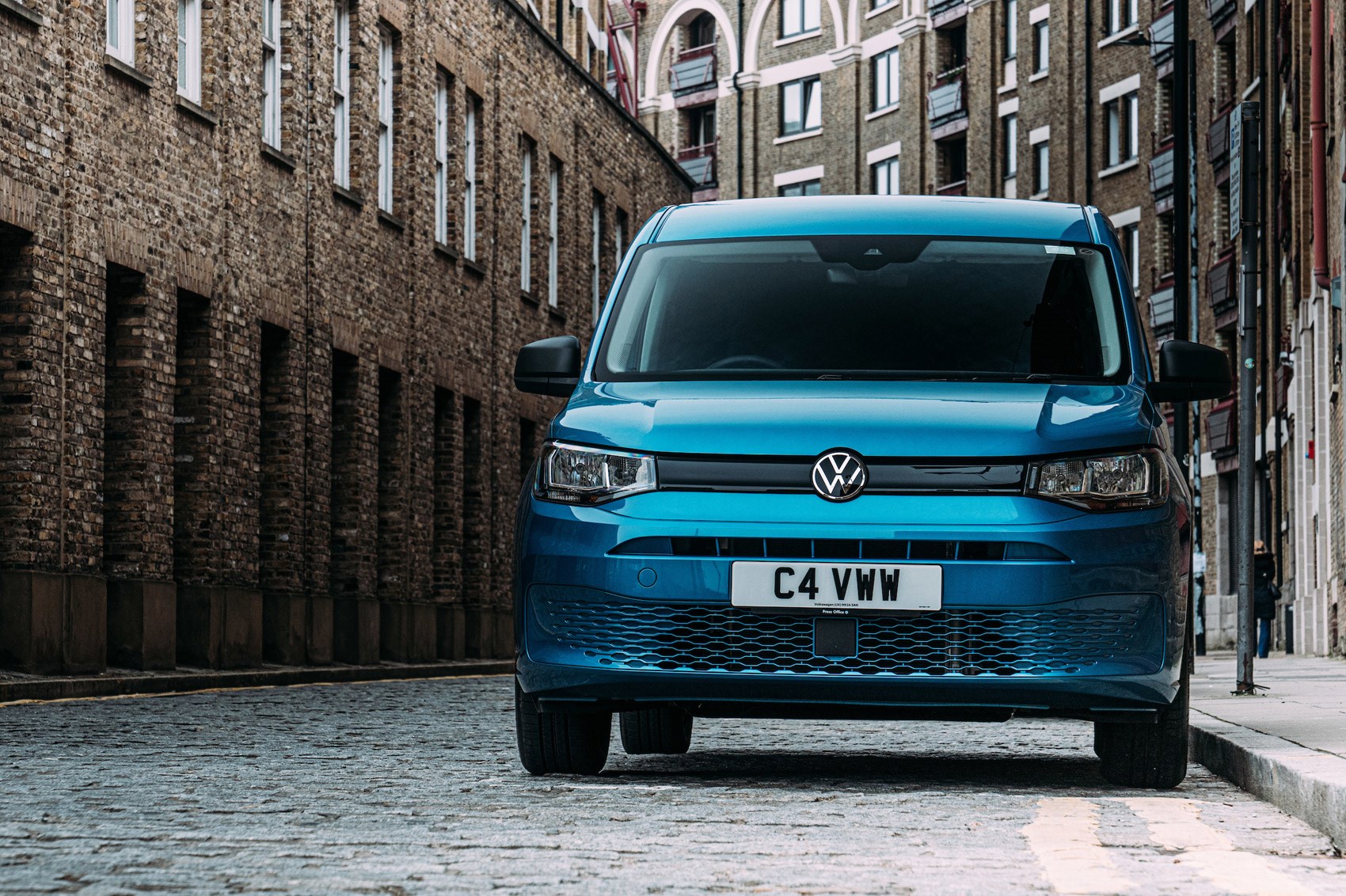 VW Caddy Cargo review, 2021, dead-on front view, blue