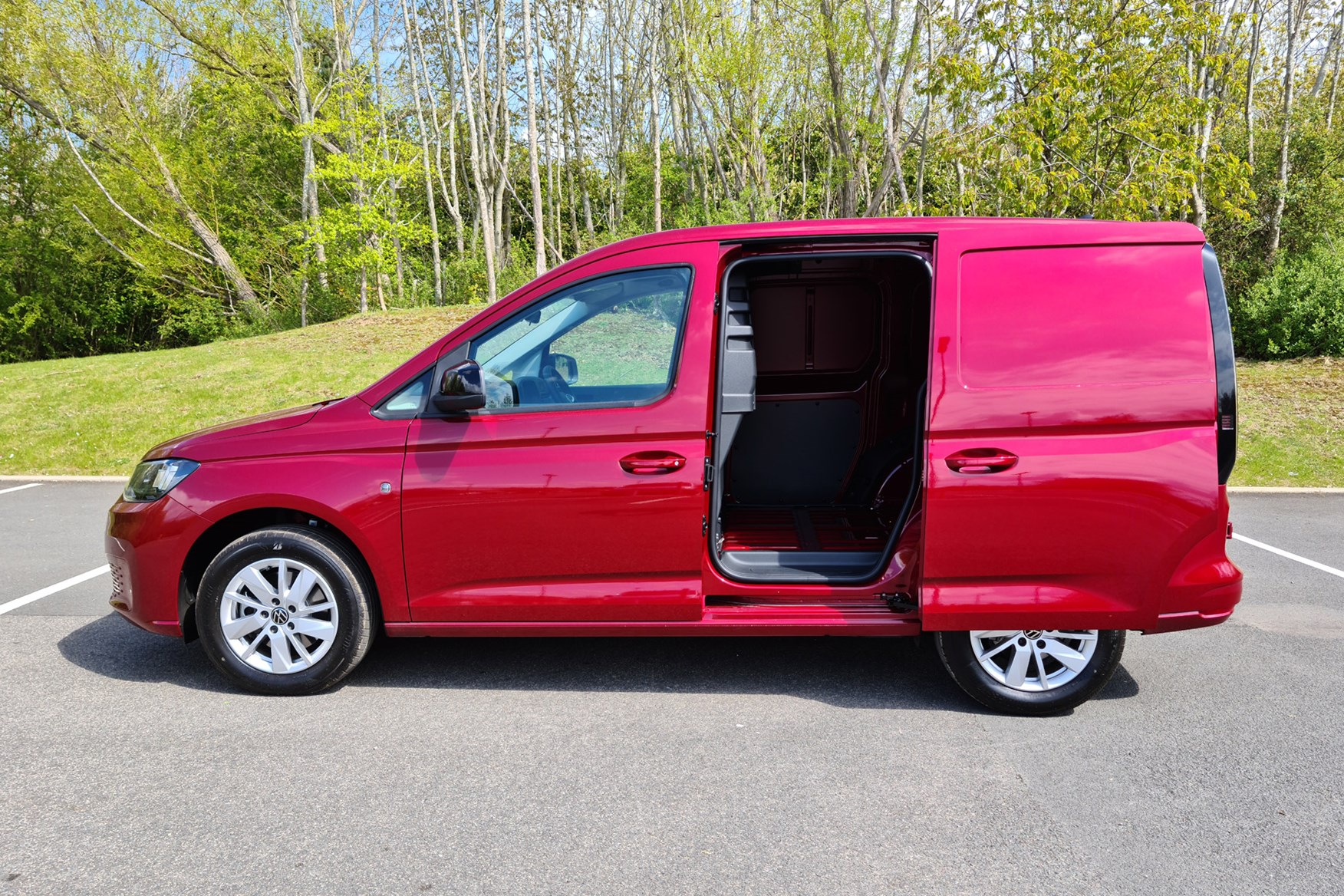 Volkswagen Caddy Cargo 1.5 TSI petrol review - side view, red, with sliding door open