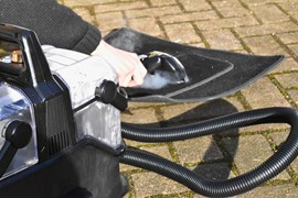 Cleaning a floor mat with the Bissell SpotClean HydroSteam