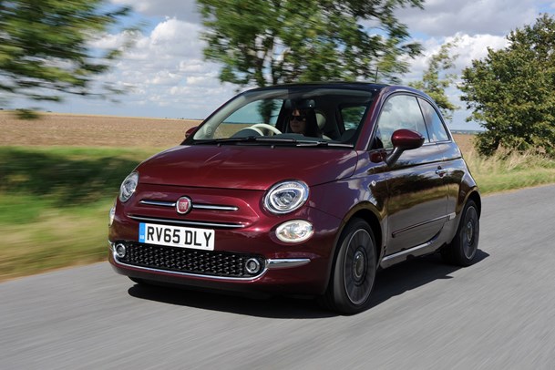 Red Fiat 500 driving front 2015