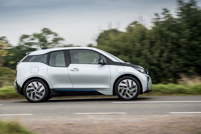 BMW i3 (2021) profile view, driving