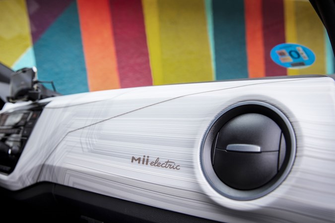 SEAT Mii Electric review - dashboard panel with IML foil and Mii Electric script, 2019