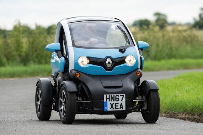 Blue and white 2018 Renault Twizy coupe front three-quarter driving