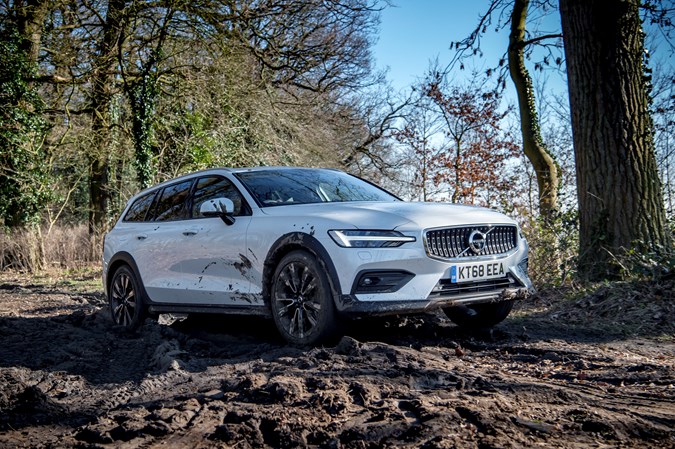 White 2019 Volvo V60 Cross Country driving off-road