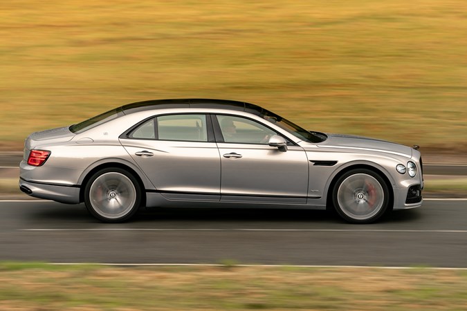 Bentley Flying Spur (2020) side view, driving