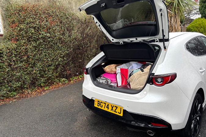 Mazda 3 open boot with luggage