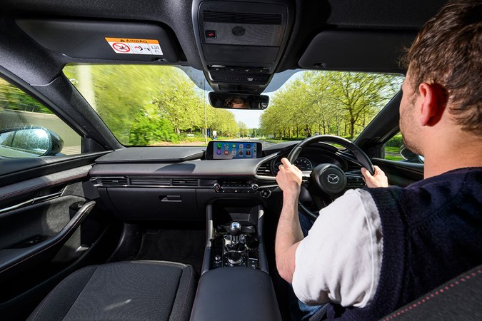 Mazda 3 in car driving