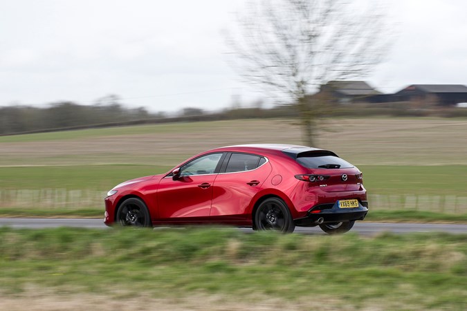 Mazda 3 Sport Lux Skyactiv-X, driving rear 2019