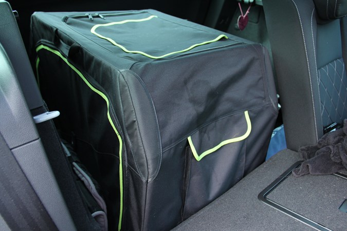 The dogcrate in the Skoda Karoq, dropping the 70 split of the rear seats to get a better fit.