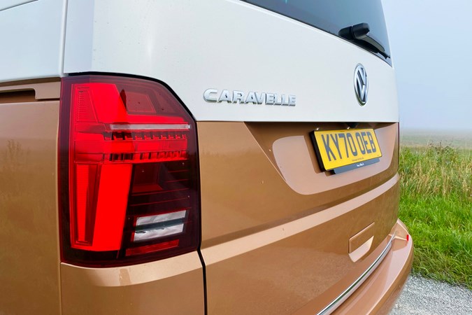 Copper and white 2021 Volkswagen Caravelle rear light and badge detail